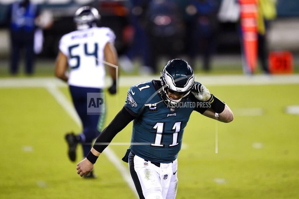 Derik Hamilton Philadelphia Eagles' Carson Wentz walks off the field during the first half of an NFL football game against the Seattle Seahawks, Monday, Nov. 30, 2020, in Philadelphia. (AP Photo/Derik Hamilton)