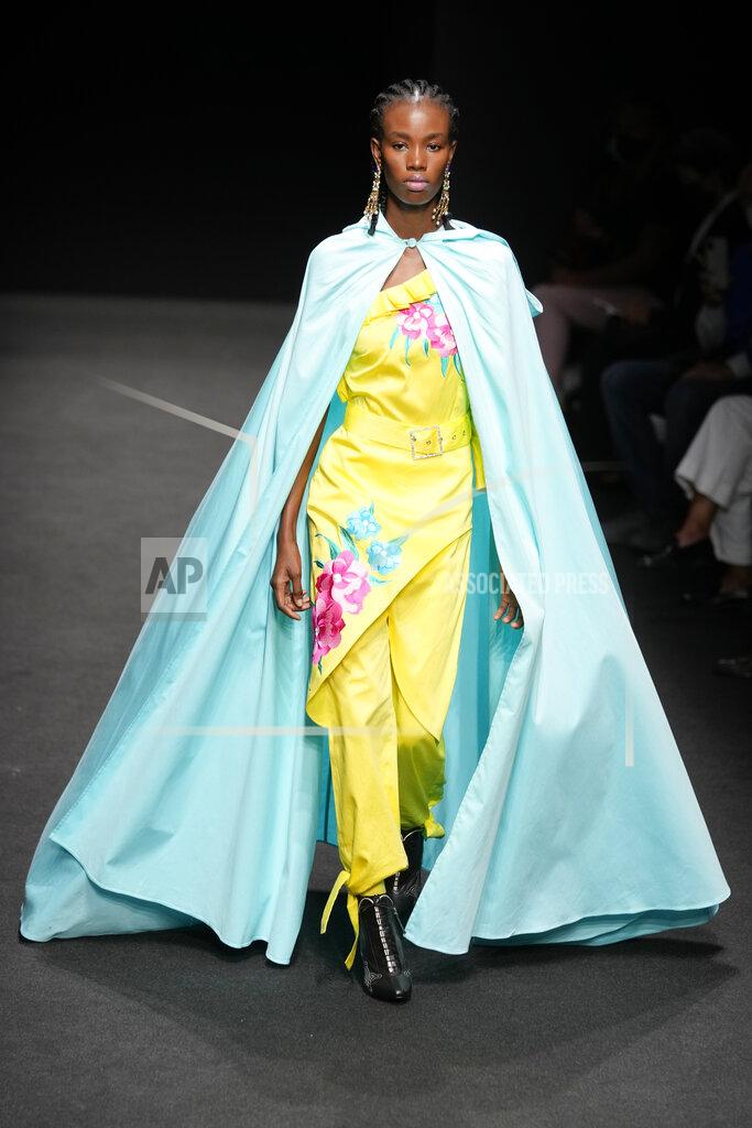 Luca Bruno A model wears a creation of Joy Meribe's Spring Summer 2022 collection, unveiled during the Milan Fashion Week, in Milan, Italy, Wednesday, Sept. 22, 2021. (AP Photo/Luca Bruno)