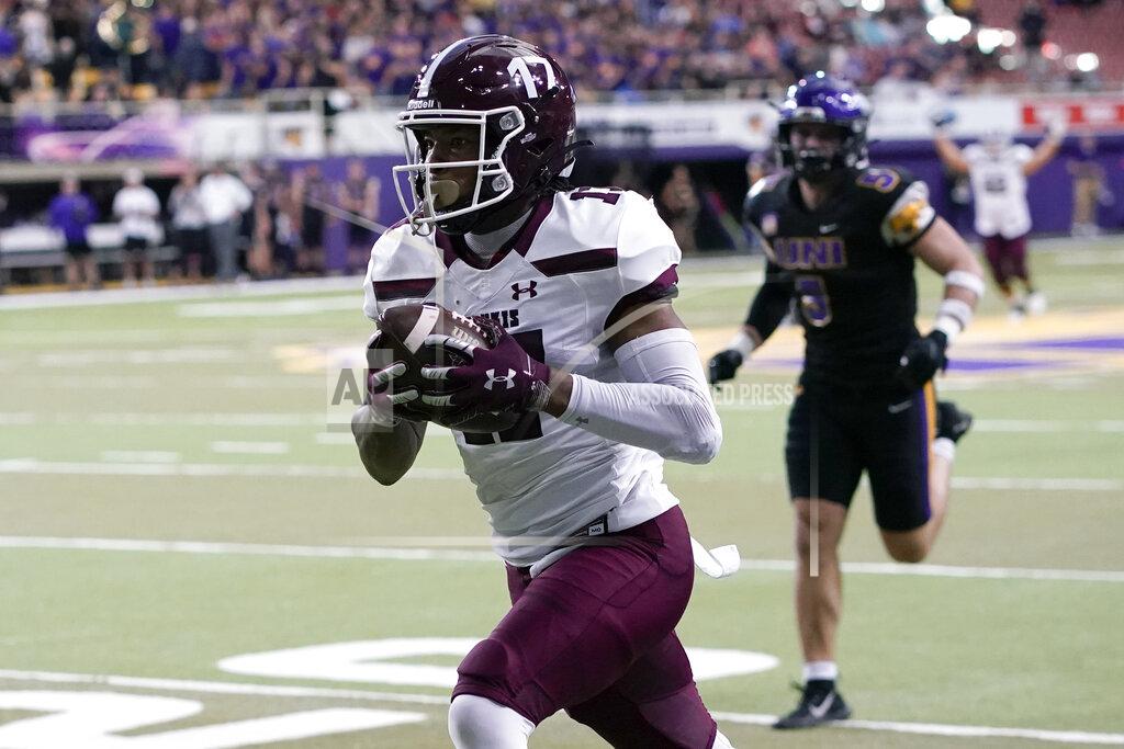 Charlie Neibergall Southern Illinois wide receiver Landon Lenoir (17) runs from Northern Iowa defensive back Korby Sander (5) during a 52-yard touchdown reception in the first half of an NCAA college football game, Saturday, Oct. 30, 2021, in Cedar Falls, Iowa. (AP Photo/Charlie Neibergall)