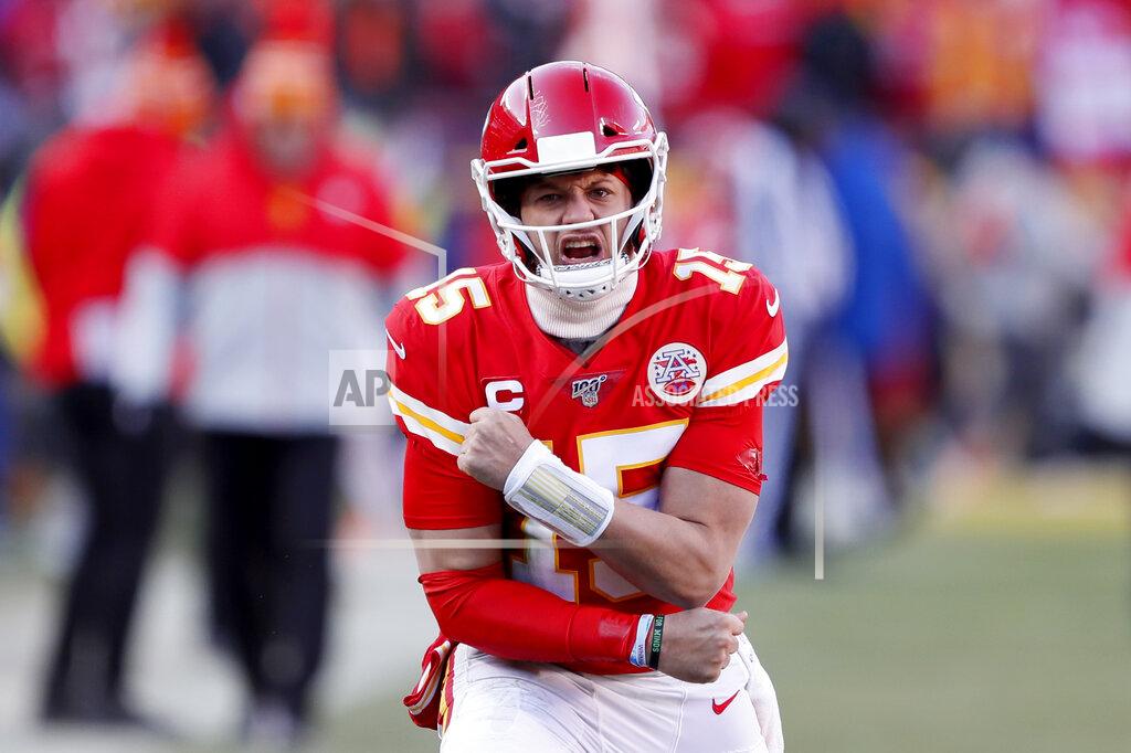 Charlie Neibergall Kansas City Chiefs' Patrick Mahomes reacts after throwing a touchdown pass to Tyreek Hill during the first half of the NFL AFC Championship football game against the Tennessee Titans Sunday, Jan. 19, 2020, in Kansas City, MO. (AP Photo/Charlie Neibergall)
