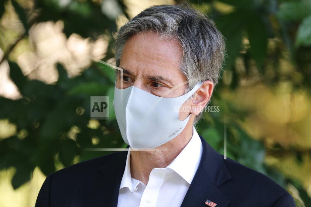 Evelyn Hockstein U.S. Secretary of State Antony Blinken listens during a visit to see Rutas Naturbanas and of the launch of National Land Use, Land Cover, and Ecosystems Monitoring System (SIMOCUTE), Wednesday, June 2, 2021, in San Jose, Costa Rica. (Evelyn Hockstein/Pool via AP)