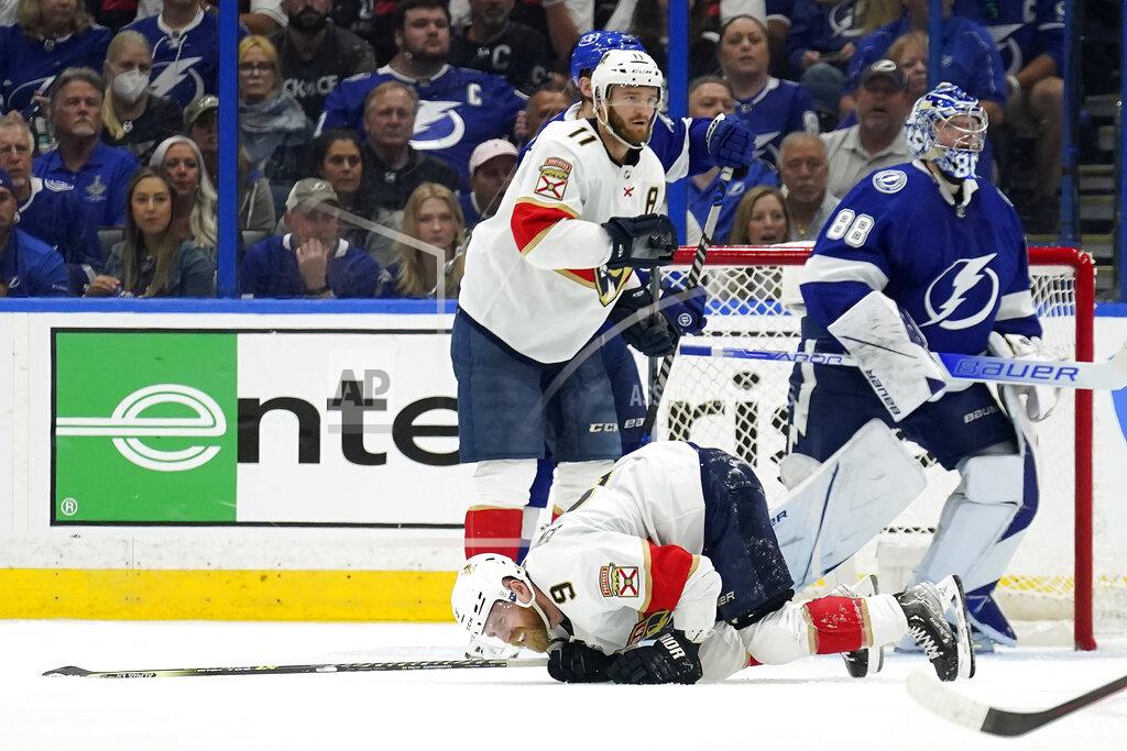 Chris O'MEara Florida Panthers center Sam Bennett (9) goes down after blocking a shot in front of Tampa Bay Lightning goaltender Andrei Vasilevskiy (88) during the second period in Game 4 of an NHL hockey second-round playoff series Monday, May 23, 2022, in Tampa, Fla. (AP Photo/Chris O'Meara)
