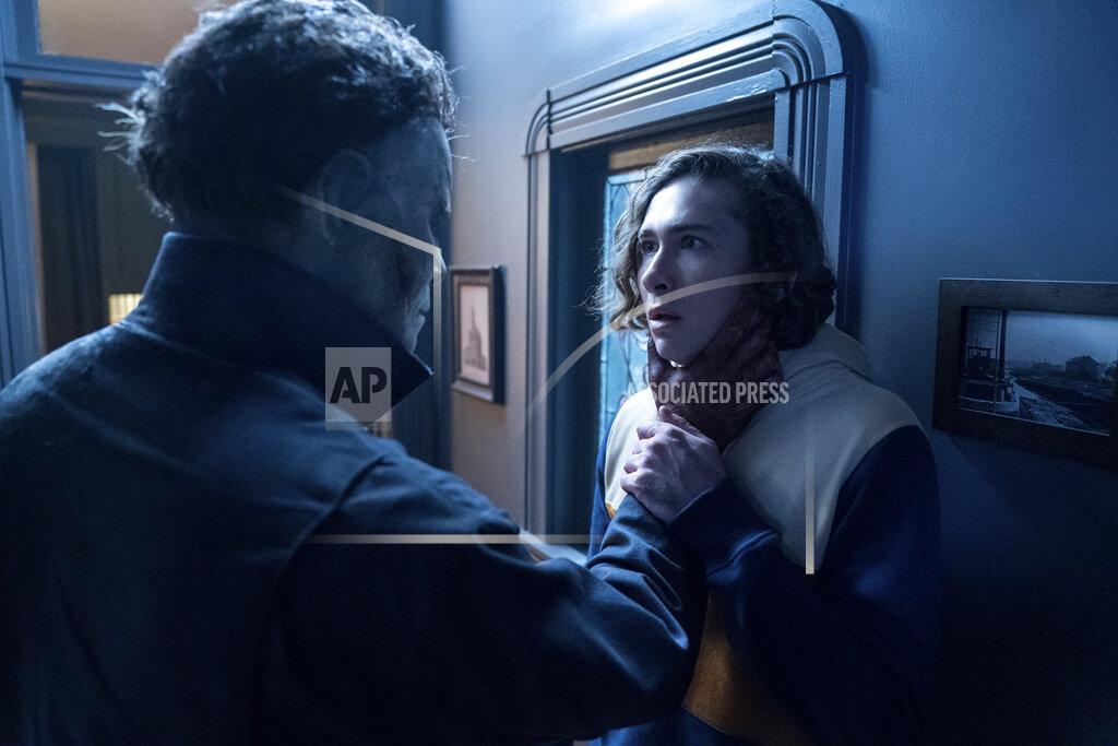 Ryan Green This image released by Universal Pictures shows Dylan Arnold, right, in "Halloween Kills," directed by David Gordon Green. (Ryan Green/Universal Pictures via AP)