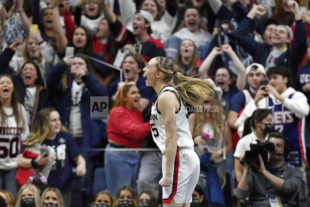 Jessica Hill Connecticut's Paige Bueckers reacts at the end of a second-round women's college basketball game against Central Florida in the NCAA tournament, Monday, March 21, 2022, in Storrs, Conn. (AP Photo/Jessica Hill)