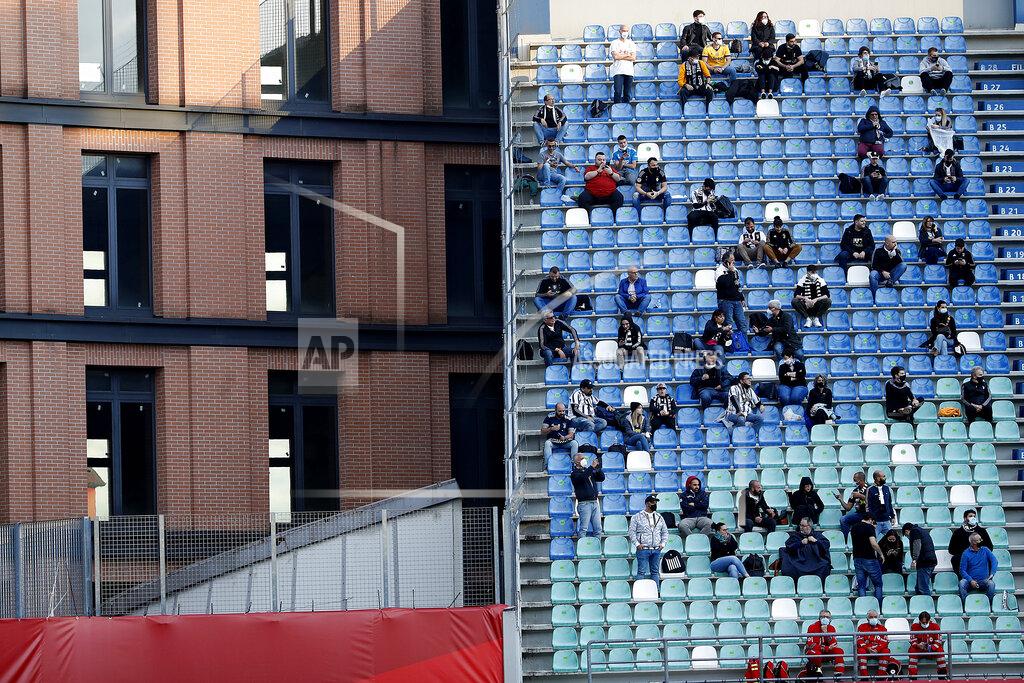 Antonio Calanni Juventus fans keep distance as there wearing face protection masks are seen before the Italian Cup soccer final match between Atalanta and Juventus at the Mapei Stadium in Reggio Emilia, Italy, Wednesday, May 19, 2021. (AP Photo/Antonio Calanni)