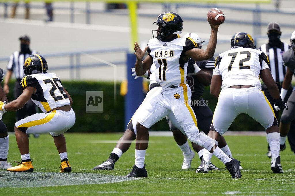 Rogelio V. Solis Arkansas-Pine Bluff quarterback Skyler Perry (11) drops back to pass against Alabama A&M during the first half of the Southwestern Athletic Conference NCAA college football game, Saturday, May 1, 2021, in Jackson, Miss. (AP Photo/Rogelio V. Solis)