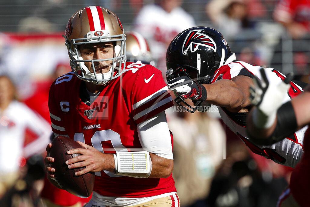 Josie Lepe Atlanta Falcons defensive end Vic Beasley, right, reaches to sack San Francisco 49ers quarterback Jimmy Garoppolo during the first half of an NFL football game in Santa Clara, Calif., Sunday, Dec. 15, 2019. (AP Photo/Josie Lepe)