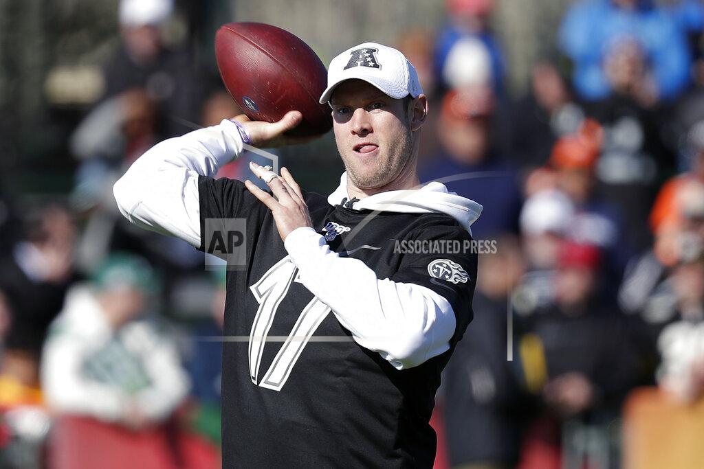 John Raoux AFC quarterback Ryan Tannehill of the Tennessee Titans throws a pass during a practice for NFL Pro Bowl football game Wednesday, Jan. 22, 2020, in Kissimmee, Fla. (AP Photo/John Raoux)