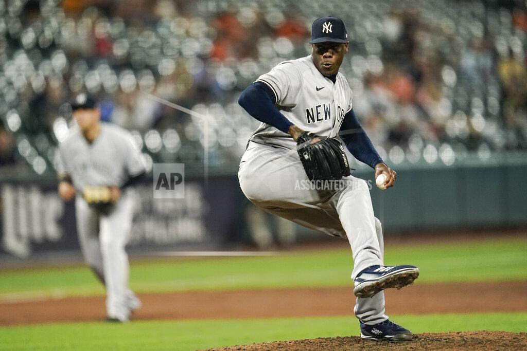 Julio Cortez New York Yankees relief pitcher Aroldis Chapman throws a pitch to the Baltimore Orioles during the ninth inning of a baseball game, Tuesday, Sept. 14, 2021, in Baltimore. (AP Photo/Julio Cortez)