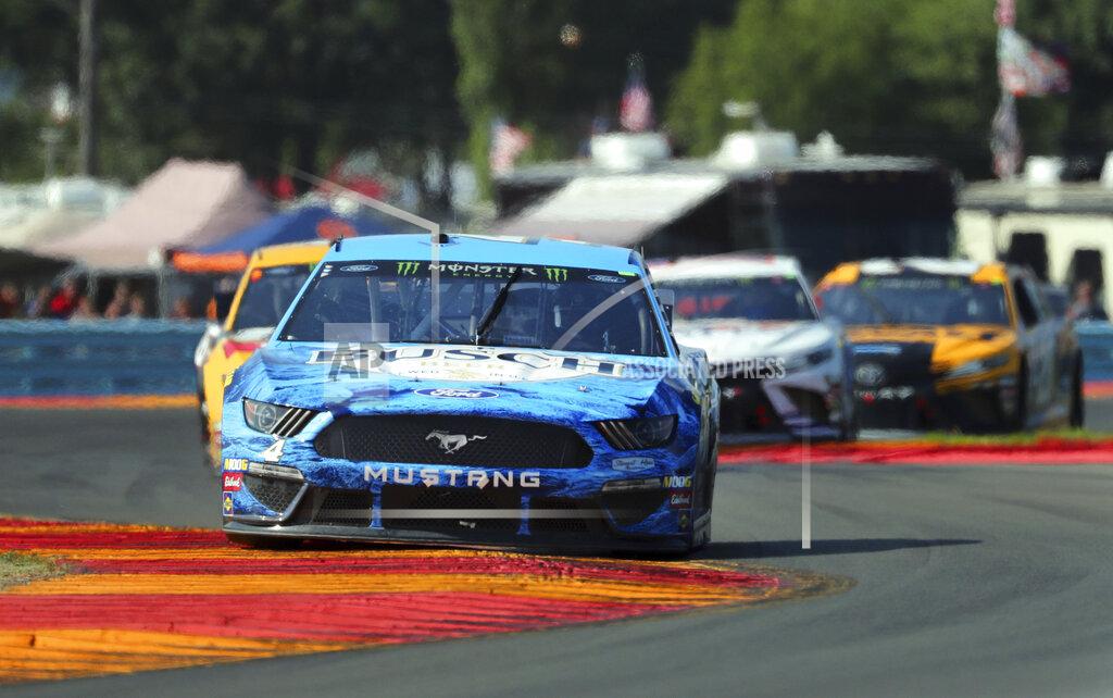 John Munson Kevin Harvick heads through the Bus Stop during a NASCAR Cup Series auto race at Watkins Glen International, Sunday, Aug. 4, 2019, in Watkins Glen, N.Y. (AP Photo/John Munson)