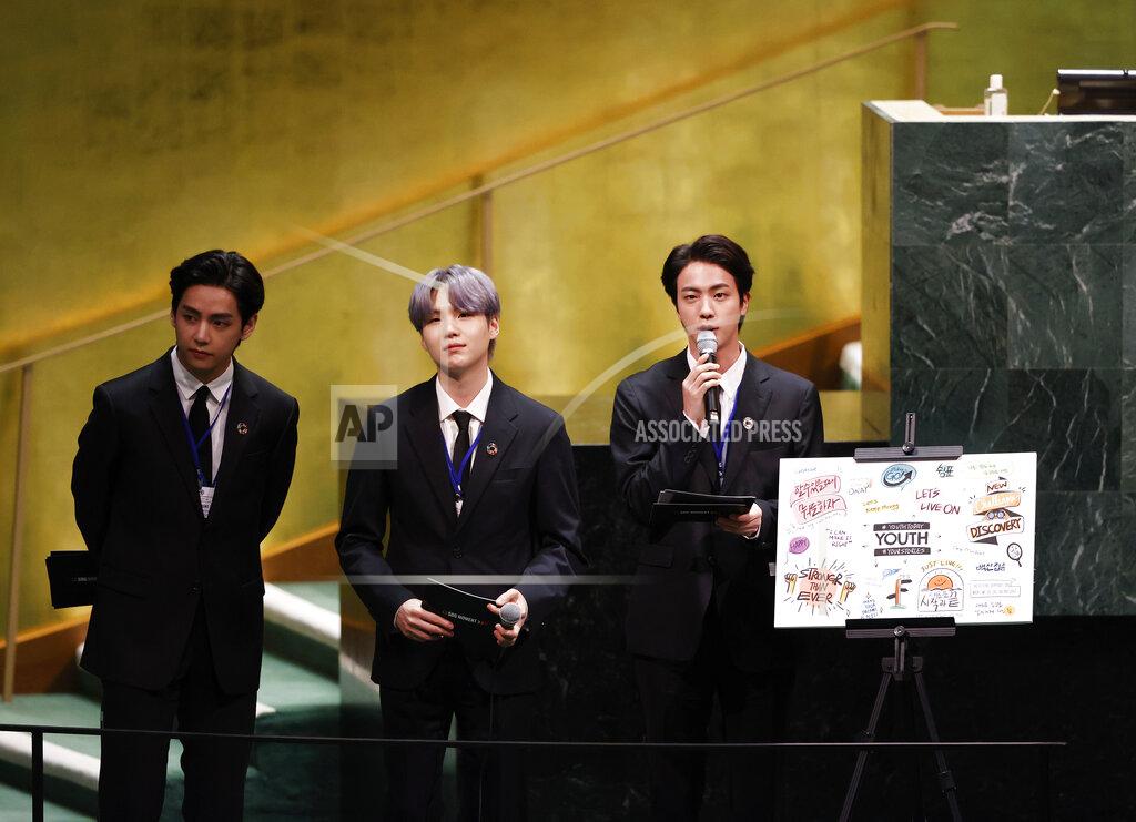 John Angelillo ADDS IDS - Members of of South Korean K-pop band BTS, from left, V, Suga and Jin appear at the United Nations meeting on Sustainable Development Goals during the 76th session of the U.N. General Assembly, at U.N. headquarters on Monday, Sept. 20, 2021. (John Angelillo/Pool Photo via AP)
