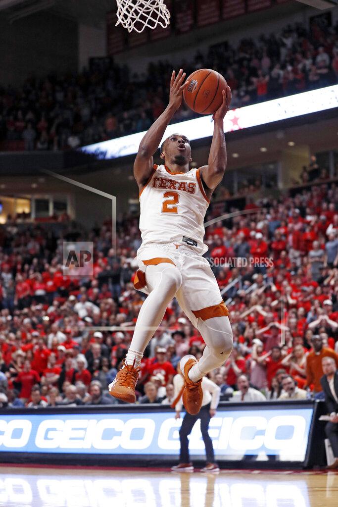 Brad Tollefson Texas' Matt Coleman III (2) breaks away to lay up the ball during the second half of an NCAA college basketball game against Texas Tech, Saturday, Feb. 29, 2020, in Lubbock, Texas. (AP Photo/Brad Tollefson)