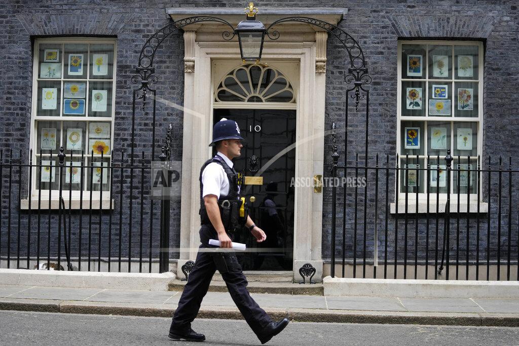 Frank Augstein A police officer walks past 10 Downing Street in London, Monday, May 23, 2022. The general public waits for the release of Sue Gray's report into COVID lockdown breaches across Whitehall, the so called "Partygate". (AP Photo/Frank Augstein)