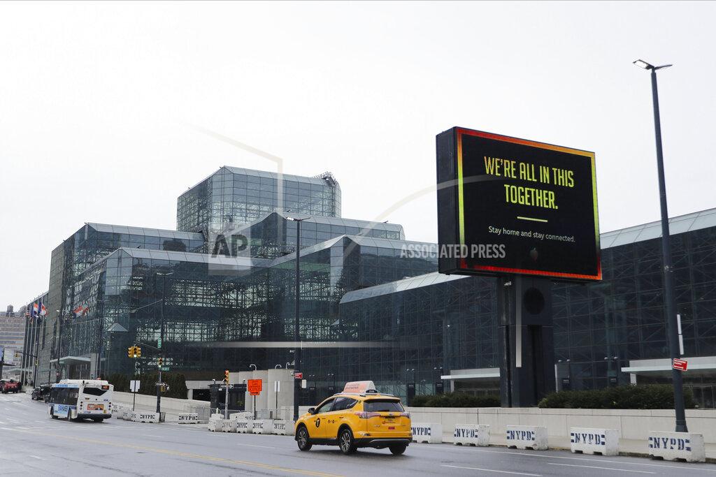 Frank Franklin Ii Cars pass the Jacob Javitz convention Center Friday, April 3, 2020, in New York. New York Gov. Andrew Cuomo announced that The Jacob K. Javits Convention Center in New York City will be "converted to a COVID facility." The original plan was that non-COVID patients would go to the convention center and it would be an "overflow for hospitals." (AP Photo/Frank Franklin II)