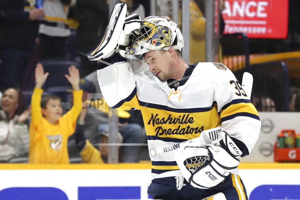 Mark Humphrey FILE - In this Feb. 16, 2020, file photo, Nashville Predators goaltender Pekka Rinne, of Finland, skates back to the net during the third period of the team's NHL hockey game against the St. Louis Blues in Nashville, Tenn. The NHL's pause has the clock ticking on the career of a former Vezina Trophy winner and four-time finalist with Rinne turning 38 in November. (AP Photo/Mark Humphrey, File)