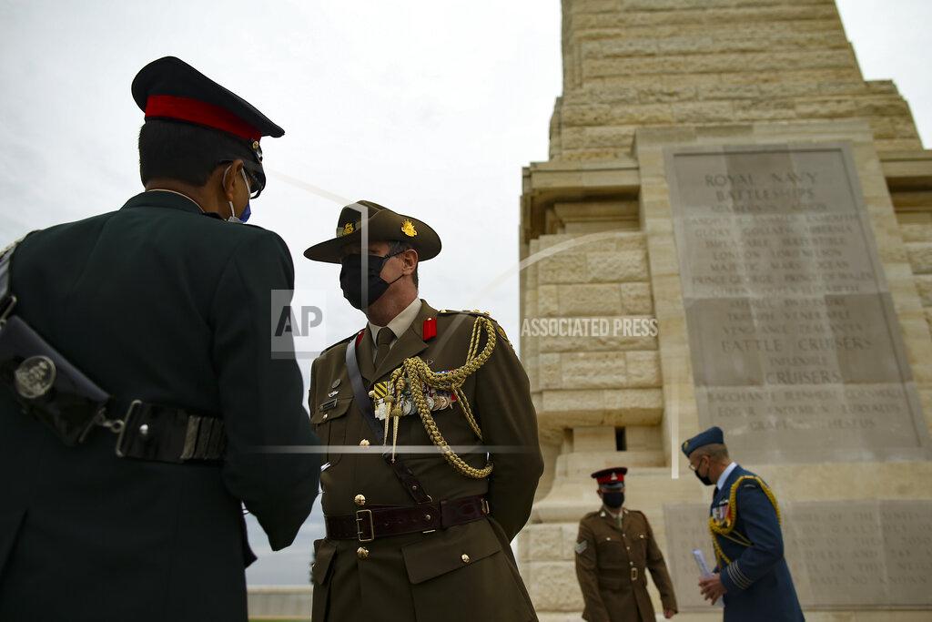 Emrah Gurel Military personnel attend a ceremony to commemorate soldiers who died during the World War I campaign on the Gallipoli peninsula, in Canakkale, Turkey, Saturday, April 24, 2021, on the 106th anniversary of the Gallipoli Campaign. The Gallipoli Campaign of 1915 by Allied forces aimed to take control of the peninsula to weaken the Ottoman Empire. The campaign failed and Allied forces withdrew after eight months of fighting on the ground and some 250,000 casualties on both sides. The memorials were kept small due to the COVID-19 pandemic.(AP Photo/Emrah Gurel)