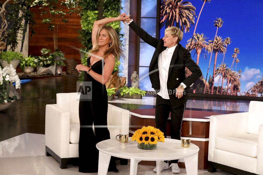 Michael Rozman In this photo released by Warner Bros., talk show host Ellen DeGeneres, right, dances with Jennifer Aniston during the final taping of "The Ellen DeGeneres Show" at the Warner Bros. lot in Burbank, Calif. (Michael Rozman/Warner Bros. via AP)