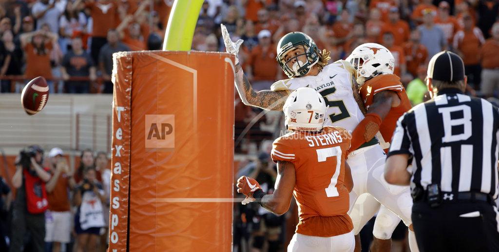 Eric Gay A game-ending, incomplete pass sails over Baylor wide receiver Jalen Hurd (5) during the second half of an NCAA college football game against Texas , Saturday, Oct. 13, 2018, in Austin, Texas. (AP Photo/Eric Gay)