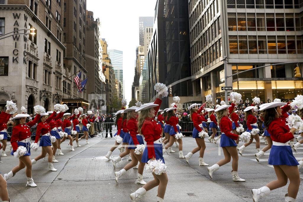 Jeenah Moon Cheerleaders make their way down Sixth Avenue during the Macy's Thanksgiving Day Parade, Thursday, Nov. 24, 2022, in New York. (AP Photo/Jeenah Moon)