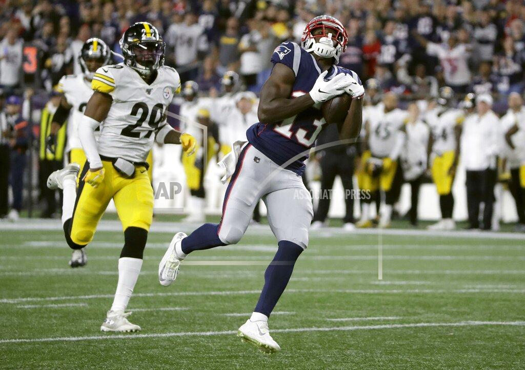 Elise Amendola New England Patriots wide receiver Phillip Dorsett catches a pass in front of Pittsburgh Steelers defensive back Kameron Kelly, left, that he ran in for a touchdown in the second half of an NFL football game, Sunday, Sept. 8, 2019, in Foxborough, Mass. (AP Photo/Elise Amendola)