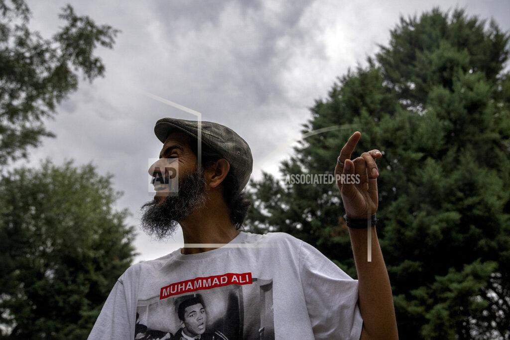 Dar Yasin Sarfaraz Javid, a Kashmiri musician and singer practices his singing along with his fellow band member during a Jamming session on the outskirts of Srinagar, Indian Kashmir, June 17, 2022. Musicians and artists in Kashmir are ordinary in life, each clutching onto the lived experiences of growing up in one of the world's most militarized zones that has known little but conflict for decades. But together, they embody a new form of music, a blend of progressive rock and hip hop that is an assertive expression of the region's political and cultural aspirations. (AP Photo/Dar Yasin)