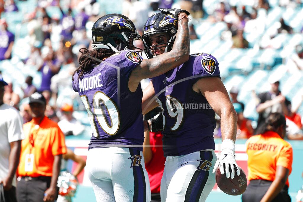 Wilfredo Lee Baltimore Ravens wide receiver Chris Moore (10) congratulates tight end Mark Andrews (89) after Andrews scored a touchdown, during the second half at an NFL football game against the Miami Dolphins, Sunday, Sept. 8, 2019, in Miami Gardens, Fla. (AP Photo/Wilfredo Lee)