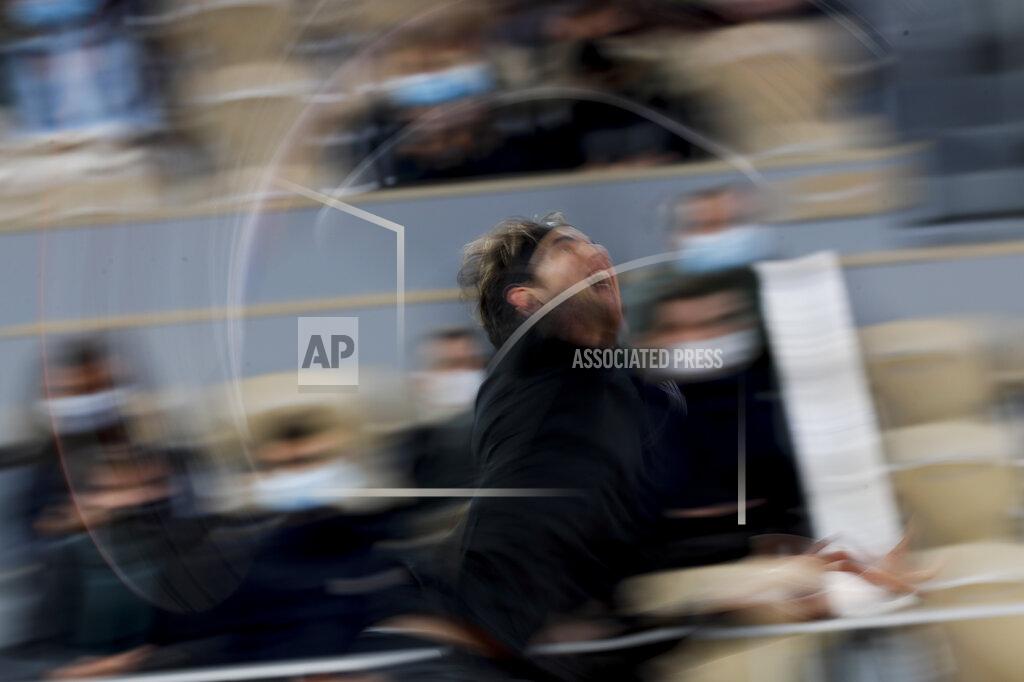Alessandra Tarantino Austria's Dominic Thiem serves against France's Hugo Gaston in the fourth round match of the French Open tennis tournament at the Roland Garros stadium in Paris, France, Sunday, Oct. 4, 2020. (AP Photo/Alessandra Tarantino)