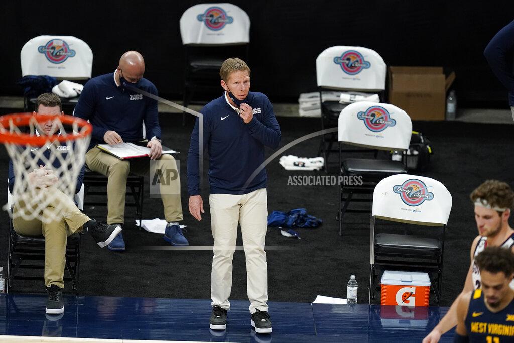 Darron Cummings Gonzaga coach Mark Few watches during the first half of the team's NCAA college basketball game against West Virginia, Wednesday, Dec. 2, 2020, in Indianapolis. (AP Photo/Darron Cummings)