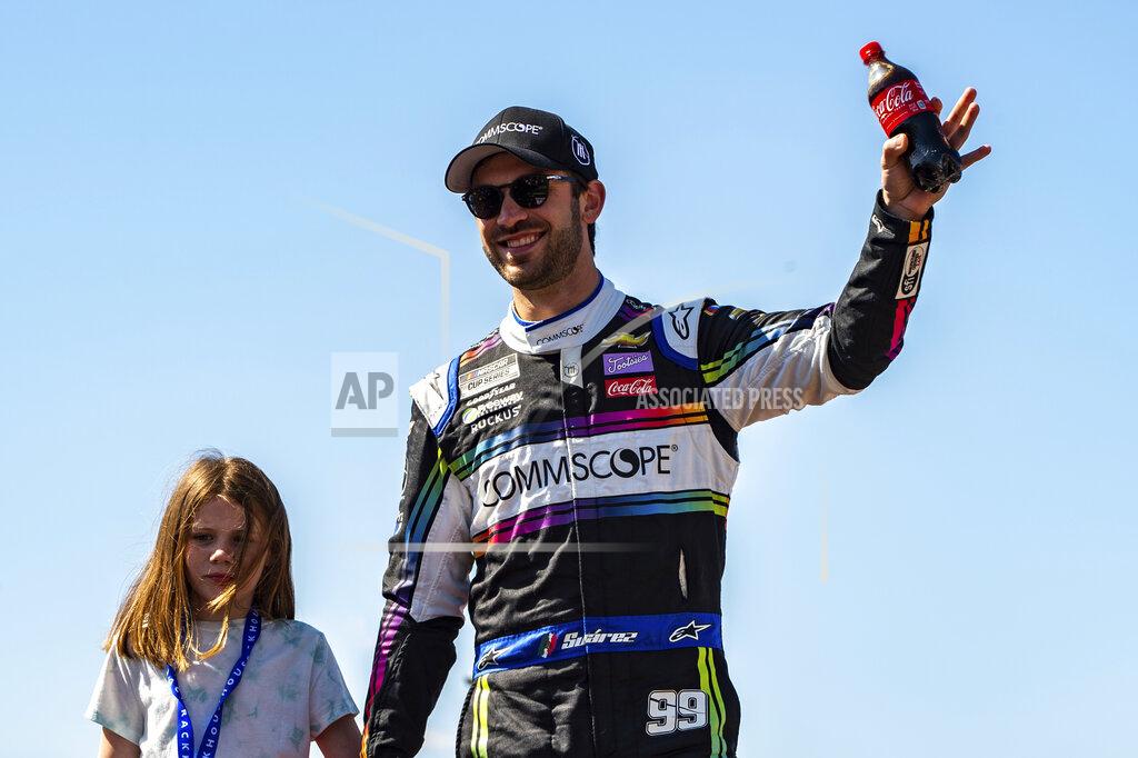 Mike Caudill Daniel Suarez is introduced during driver introductions at a NASCAR Cup Series auto race at Richmond Raceway on Sunday, April 3, 2022, in Richmond, Va. (AP Photo/Mike Caudill)