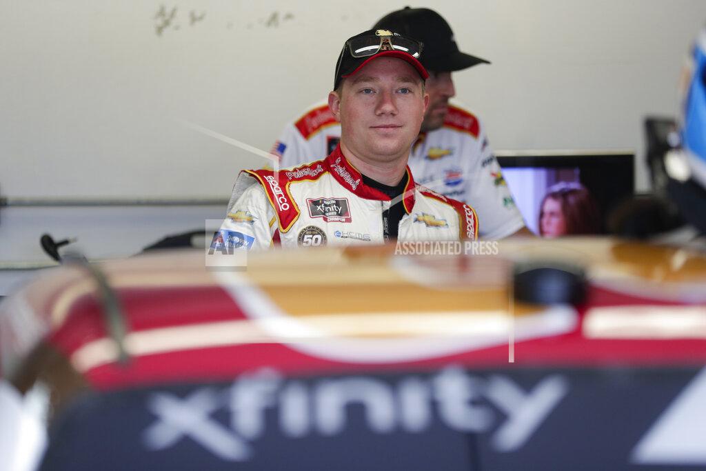 Michael Conroy NASCAR Xfinity Series driver Tyler Reddick waits in the garage area before the start of NASCAR Xfinity auto racing practice at Indianapolis Motor Speedway, Friday, Sept. 6, 2019 in Indianapolis. (AP Photo/Michael Conroy)