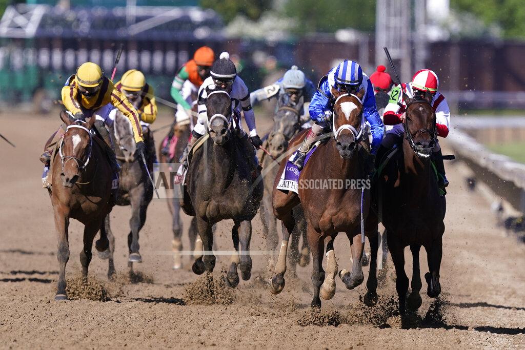 Michael Conroy John Velazquez rides Malathaat to victory during the 147th running of the Kentucky Oaks at Churchill Downs, Friday, April 30, 2021, in Louisville, Ky. (AP Photo/Michael Conroy)