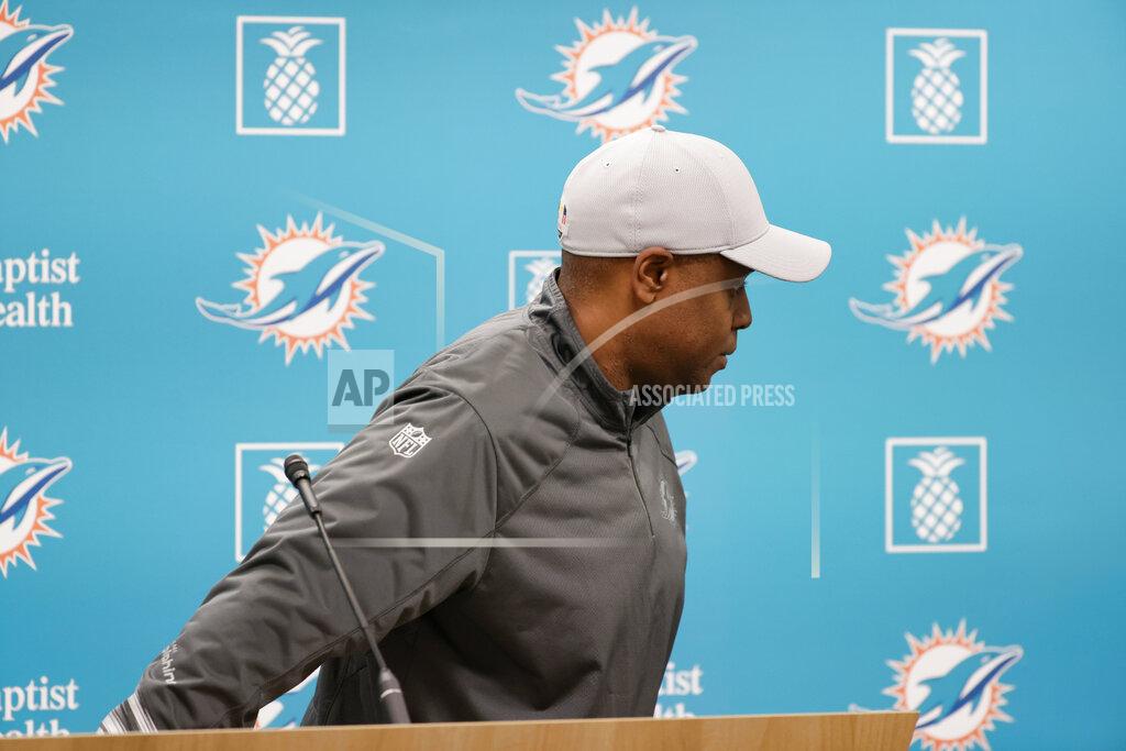 David Santiago Miami Dolphins general manager Chris Grier leaves the podium after talking to the media before practice at Baptist Health Training Complex in Hard Rock Stadium on Wednesday, Nov. 3, 2021, in Miami Gardens, Fla. Houston plays at Miami on Sunday. (David Santiago/Miami Herald via AP)