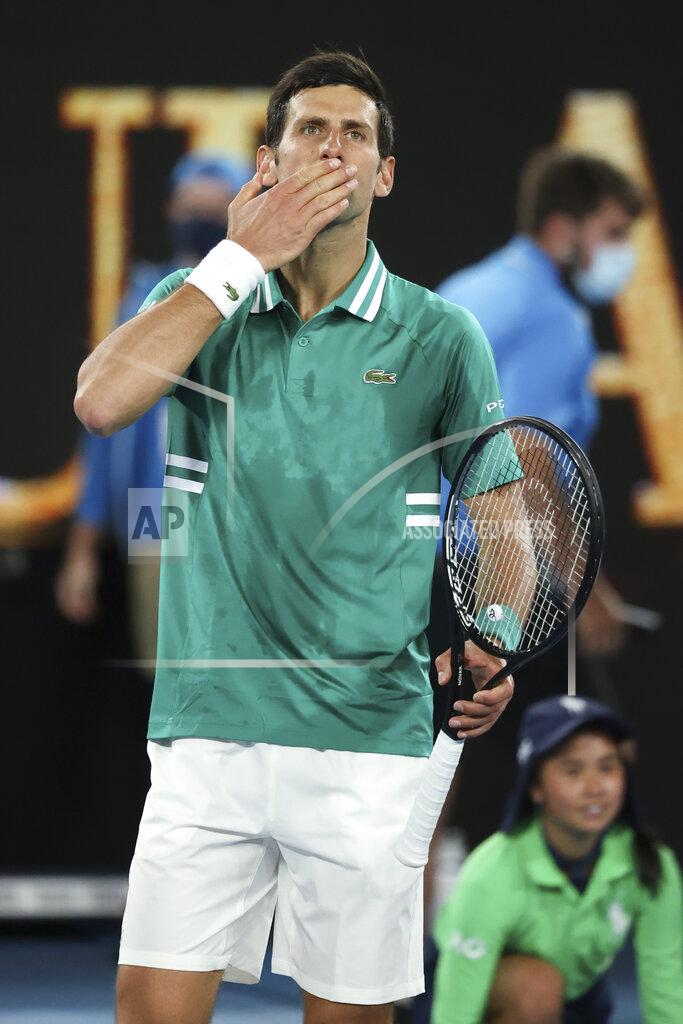 Hamish Blair Serbia's Novak Djokovic celebrates after defeating France's Jeremy Chardy during their first round match at the Australian Open tennis championship in Melbourne, Australia, Monday, Feb. 8, 2021. (AP Photo/Hamish Blair)