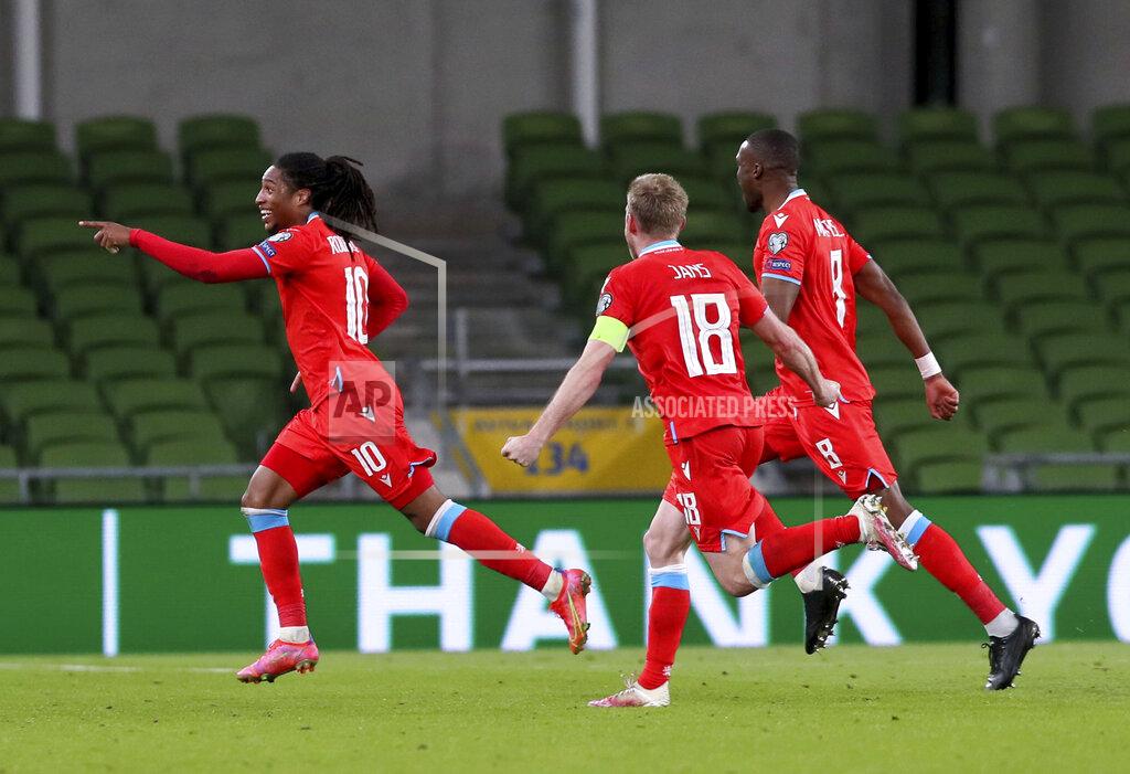 Brian Lawless Luxembourg's Gerson Rodrigues, left, celebrates scoring their side's first goal of the game during their World Cup 2022 group A qualifying soccer match against Republic of Ireland at the Aviva Stadium, Dublin, Saturday, March 27, 2021. (Brian Lawless/PA via AP)