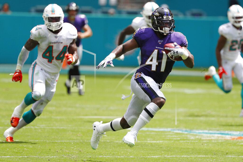 Wilfredo Lee Baltimore Ravens defensive back Anthony Levine (41) runs the ball, during the first half at an NFL football game against the Miami Dolphins, Sunday, Sept. 8, 2019, in Miami Gardens, Fla. (AP Photo/Wilfredo Lee)