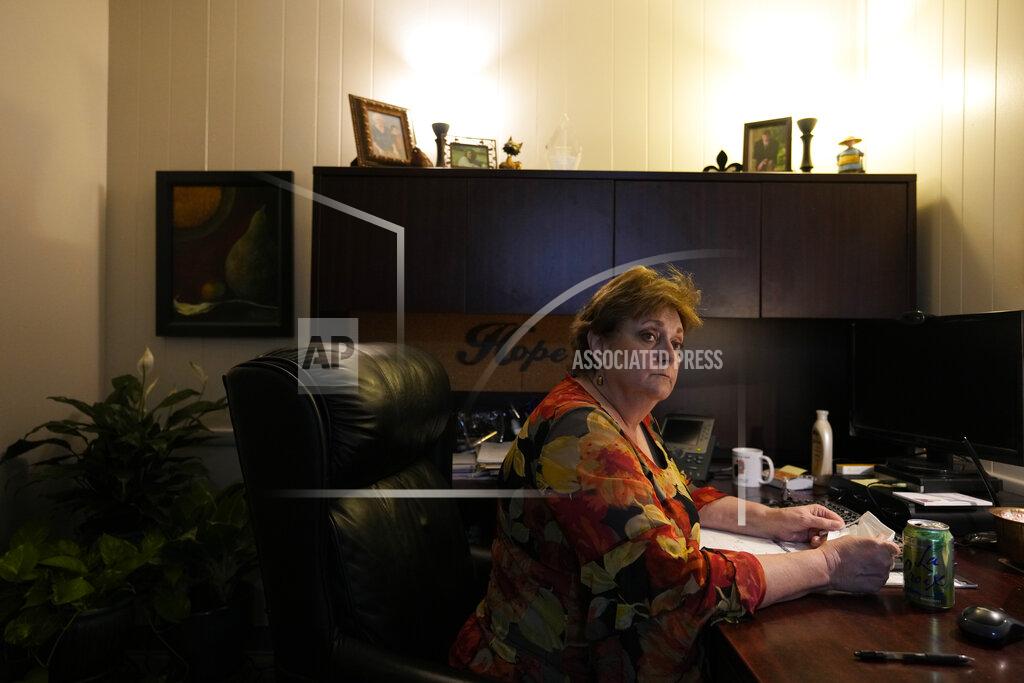 Rebecca Blackwell Clinic administrator Kathaleen Pittman, who started working in an abortion clinic 30 years ago, sits in her office during an interview with Associated Press journalists, Saturday, Oct. 9, 2021, at Hope Medical Group for Women in Shreveport, La. She said she recently spoke to a mother in Texas trying to get an abortion for her 13-year-old daughter, who was sexually assaulted. “She's a child," Pittman said. “She should not have to be on the road for hours getting here. It is absolutely heartbreaking." (AP Photo/Rebecca Blackwell)