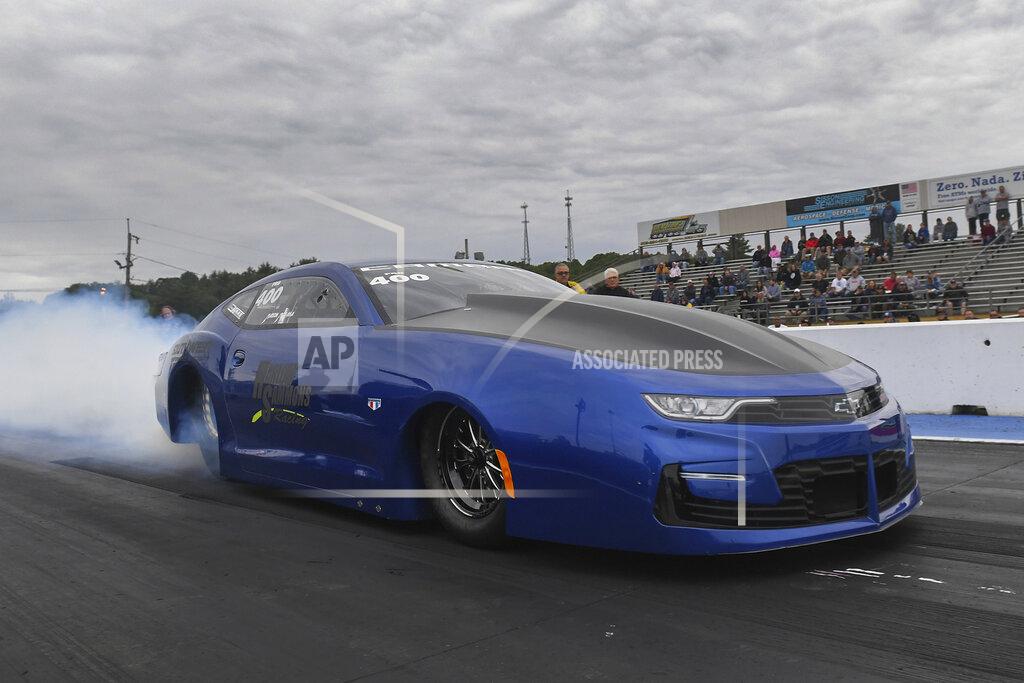 Marc Gewertz In this photo provided by the NHRA, Pro Stock newcomer Mason McGaha drives in qualifying Friday, June 11, 2021, at the NHRA New England Nationals drag races in Epping, N.H. (Marc Gewertz/NHRA via AP)