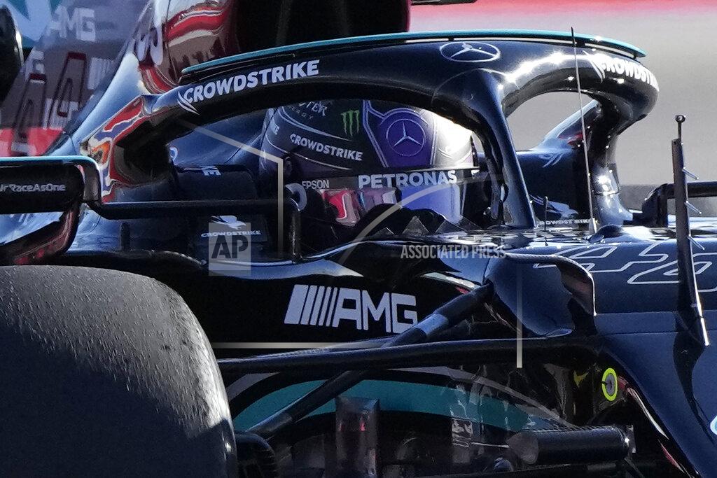 Sergei Grits Mercedes driver Lewis Hamilton of Britain steers his car during the second practice session at the Sochi Autodrom circuit, in Sochi, Russia, Friday, Sept. 24, 2021. The Russian Formula One Grand Prix will be held on Sunday. (AP Photo/Sergei Grits)