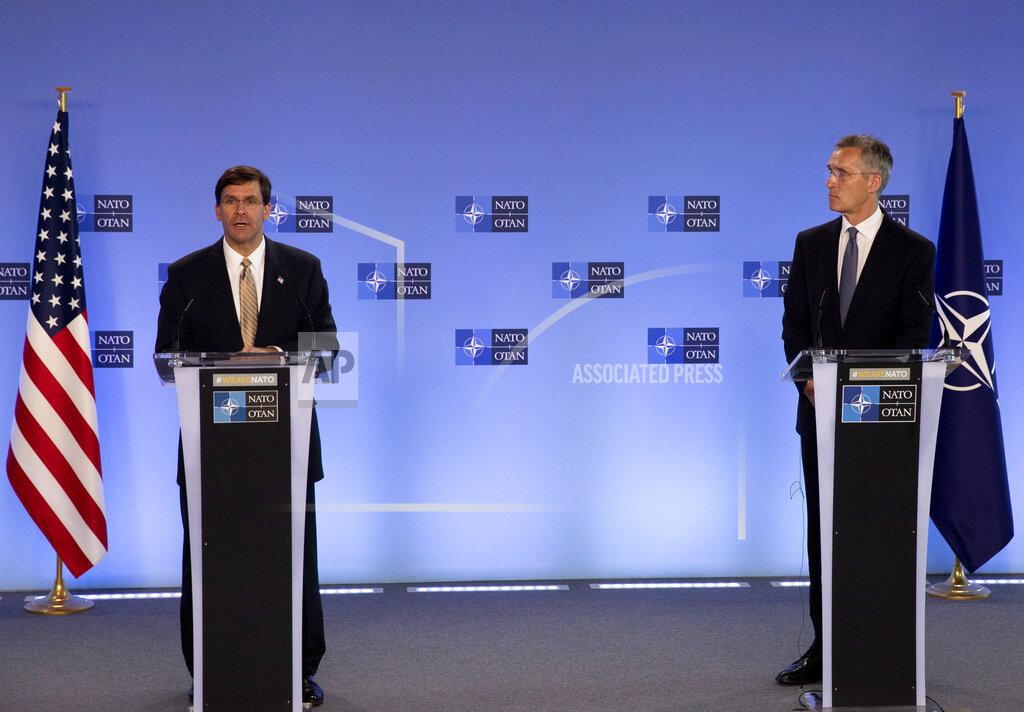 Virginia Mayo U.S. Secretary of Defense Mark Esper, left, and NATO Secretary General Jens Stoltenberg participate in a joint press conference at NATO headquarters in Brussels, Friday, June 26, 2020. U.S. Secretary of Defense Mark Esper is at NATO to follow-up on a broad range of issues raised during last week's NATO defense ministerial. (AP Photo/Virginia Mayo, Pool)