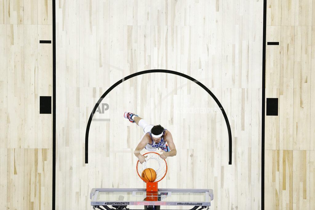 Chris Szagola UCLA's Jaime Jaquez Jr. dunks during the second half of a college basketball game against North Carolina in the Sweet 16 round of the NCAA tournament, Friday, March 25, 2022, in Philadelphia. (AP Photo/Chris Szagola)