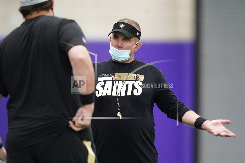 Lm Otero New Orleans Saints head coach Sean Payton, wearing a mask to prevent to spread of COVID-19, gestures while talking during NFL football practice in Fort Worth, Texas, Wednesday, Sept. 15, 2021. (AP Photo/LM Otero)