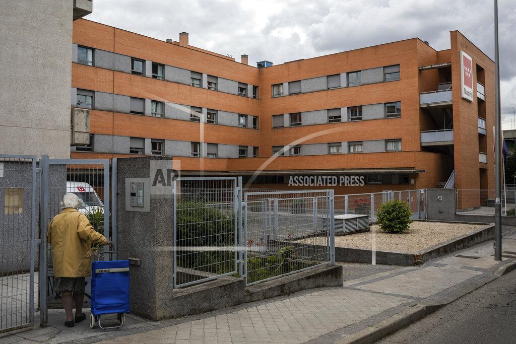 In this Wednesday, May 13, 2020 photo, view of the Usera Center for the Elderly in Madrid, Spain. Workers at the Usera nursing home have spoken about cost cutting and staff cuts at the Madrid nursing home where 42 people died.(AP Photo/Bernat Armangue)