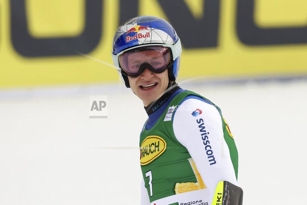 Luciano Bisi Switzerland's Marco Odermatt arrives at the finish line during an alpine ski men's World Cup super-G, in Bormio, Italy, Wednesday, Dec. 29, 2021. (AP Photo/Luciano Bisi)
