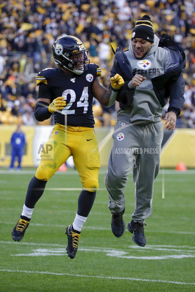 Gene J. Puskar Pittsburgh Steelers running back Benny Snell (24) leaps in celebration with injured running back James Conner (30) after he scored against the Cleveland Browns during the second half of an NFL football game, Sunday, Dec. 1, 2019, in Pittsburgh. (AP Photo/Gene J. Puskar)