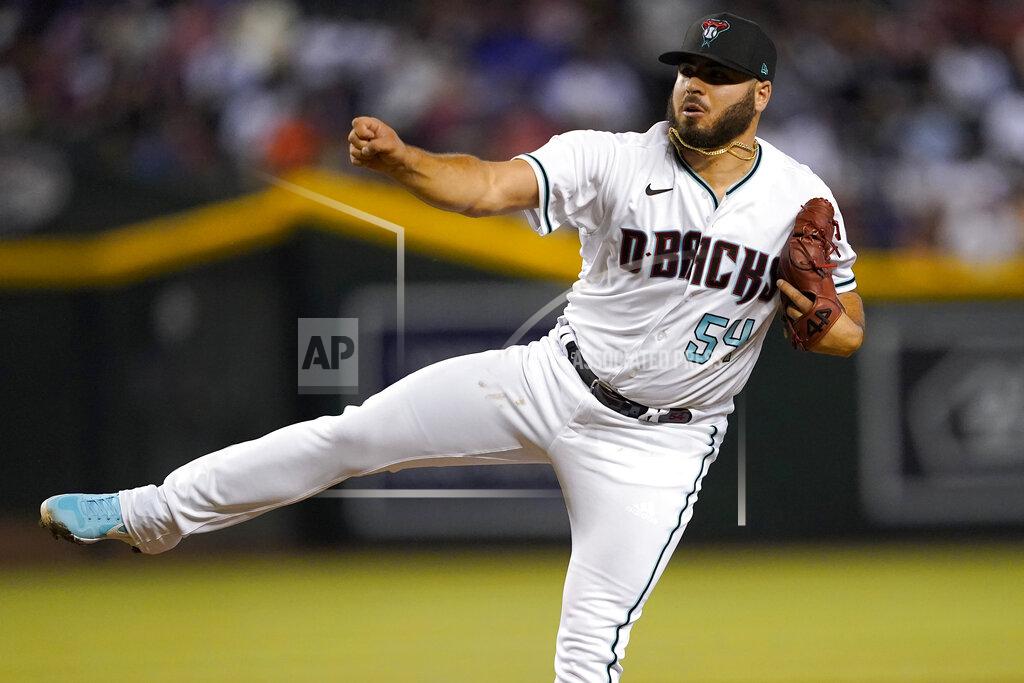 Matt York Arizona Diamondbacks pitcher Humberto Castellanos throws against the Los Angeles Dodgers during the first inning of a baseball game, Thursday, May 26, 2022, in Phoenix. (AP Photo/Matt York)