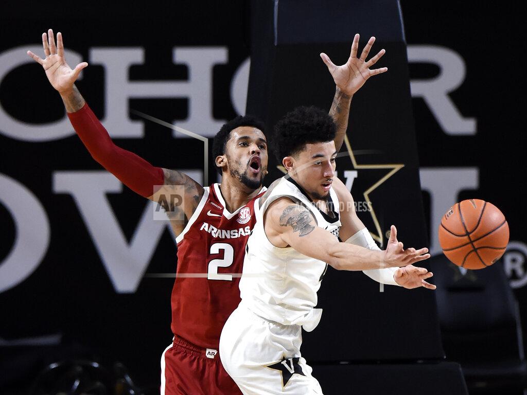 Mark Zaleski Vanderbilt guard Scotty Pippen Jr. (2) passes the ball away from Arkansas forward Vance Jackson (2) during the second half of an NCAA college basketball game against Vanderbilt Saturday, Jan. 23, 2021, in Nashville, Tenn. Arkansas won 92-71. (AP Photo/Mark Zaleski)