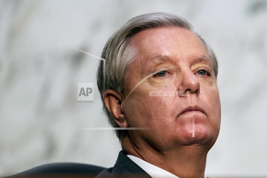 Erin Schaff Sen. Lindsey Graham, R-S.C., listens during a confirmation hearing for Supreme Court nominee Amy Coney Barrett before the Senate Judiciary Committee, Monday, Oct. 12, 2020, on Capitol Hill in Washington. (Erin Schaff/The New York Times via AP, Pool)