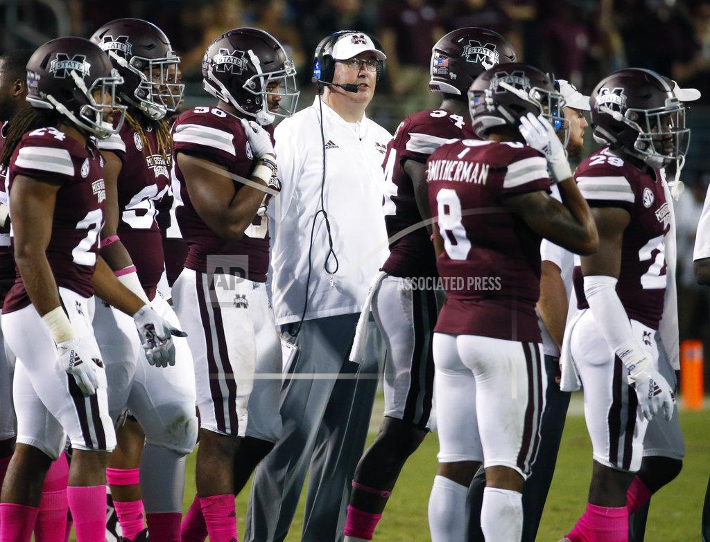 Rogelio V. Solis Mississippi State coach Joe Moorhead stands with his team during a timeout in the second half of their NCAA college football game against Auburn in Starkville, Miss., Saturday, Oct. 6, 2018. Mississippi State won 23-9. (AP Photo/Rogelio V. Solis)