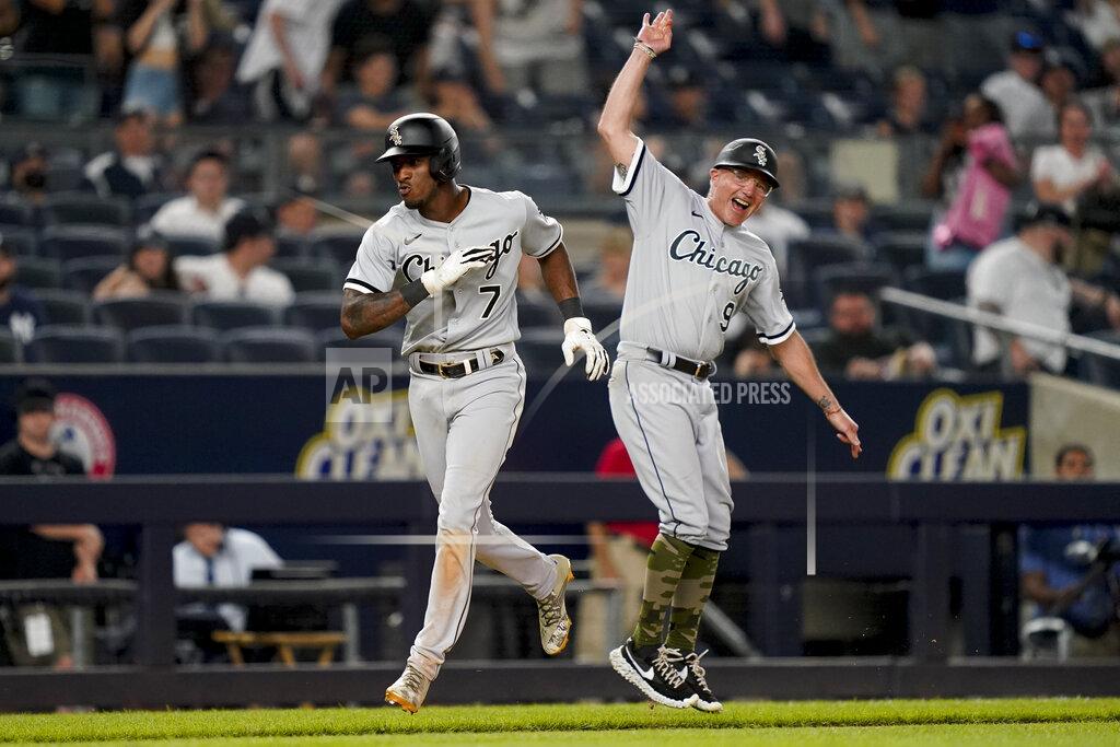 John Minchillo Chicago White Sox' Tim Anderson (7) celebrates with third base coach Joe McEwing (99) while running the bases after hitting a three-run home run off New York Yankees relief pitcher Miguel Castro in the eighth inning of the second baseball game of a doubleheader, Sunday, May 22, 2022, in New York. (AP Photo/John Minchillo)