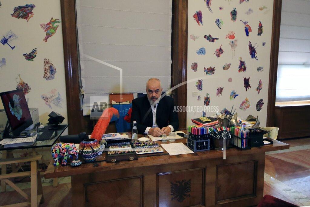 Hektor Putsina Albania's Prime Minister Edi Rama speaks during an interview with the Associated Press in Tirana, Wednesday, May 6, 2020. Western Balkan countries are optimistic in their European path, also looking forward to the bloc's post-pandemic assistance to cope with their increased economic difficulties. (AP Photo/Hektor Pustina)